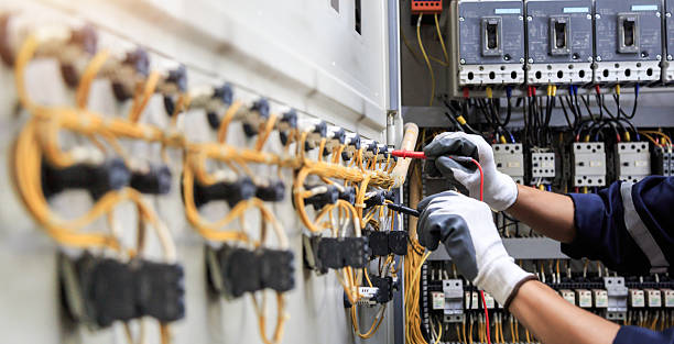 Professional Electrician technician working in Darby, PA